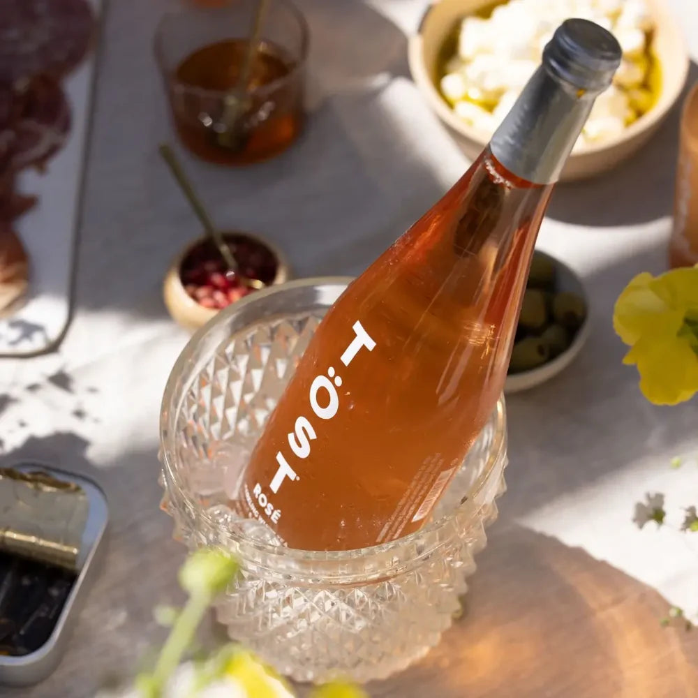 Non-alcoholic sparkling rose beverage crafted from premium white tea, elderberry, and ginger
