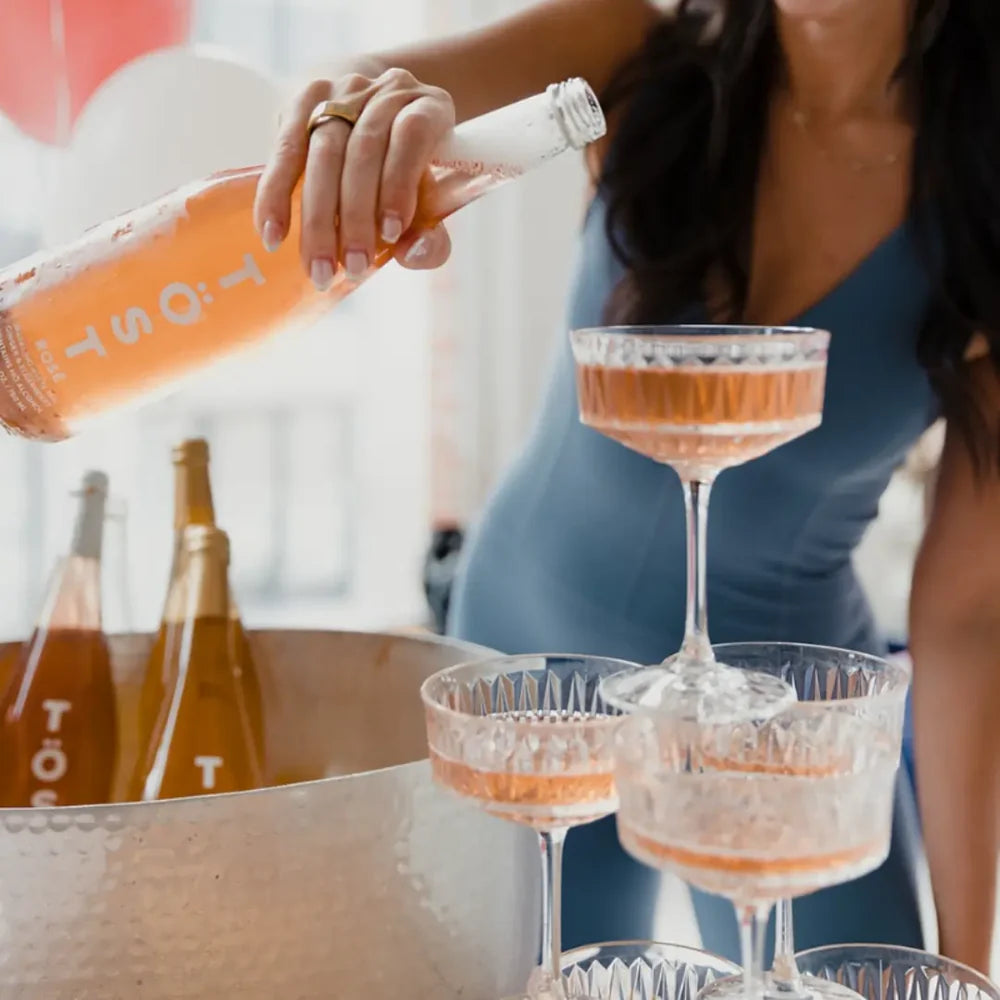 Non-alcoholic sparkling rose beverage crafted from premium white tea, elderberry, and ginger